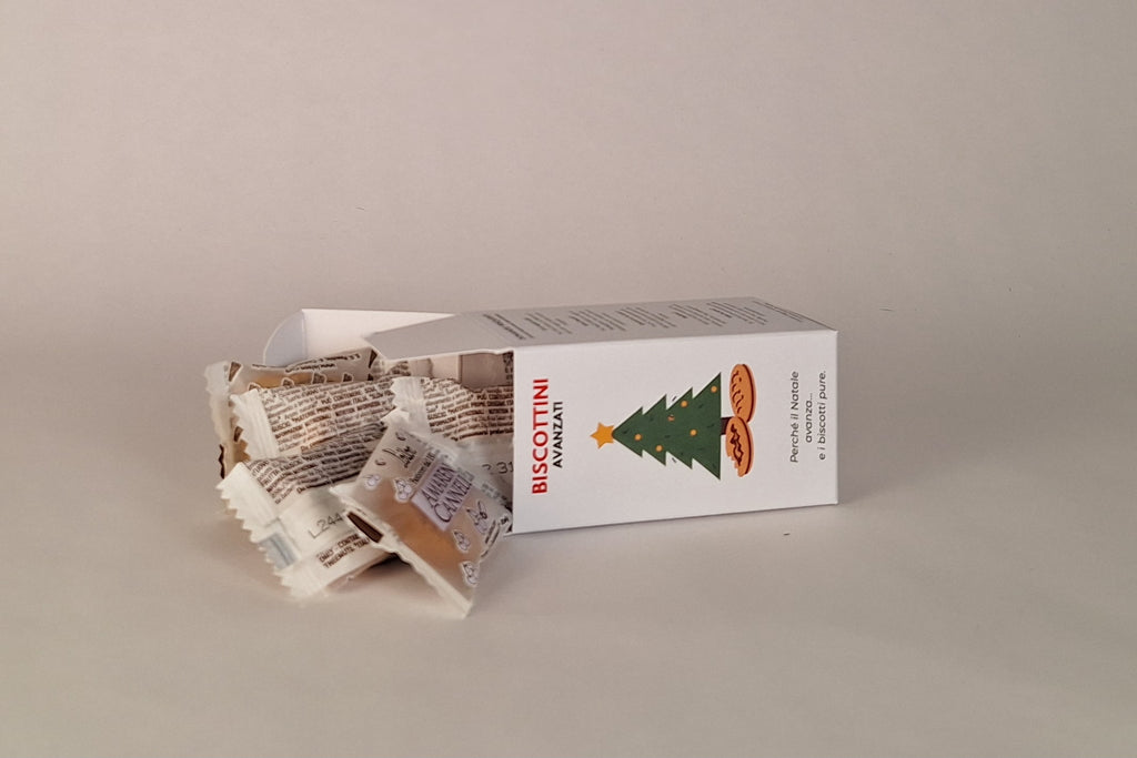 Cofanetto regalo natalizio ironico, biscotti avanzati e sarcasmo per le feste.
