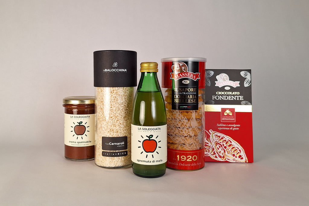 Confezione natalizia senza alcol con riso Carnaroli, crema spalmabile, succo di mela e dolci tipici biellesi