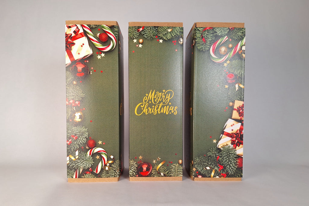 Scatola regalo di Natale Bevande Miscelate in cartone rigido con fascia decorativa Merry Christmas, ideale per bottiglie da 70 o 75 cl, confezione elegante pronta da donare.