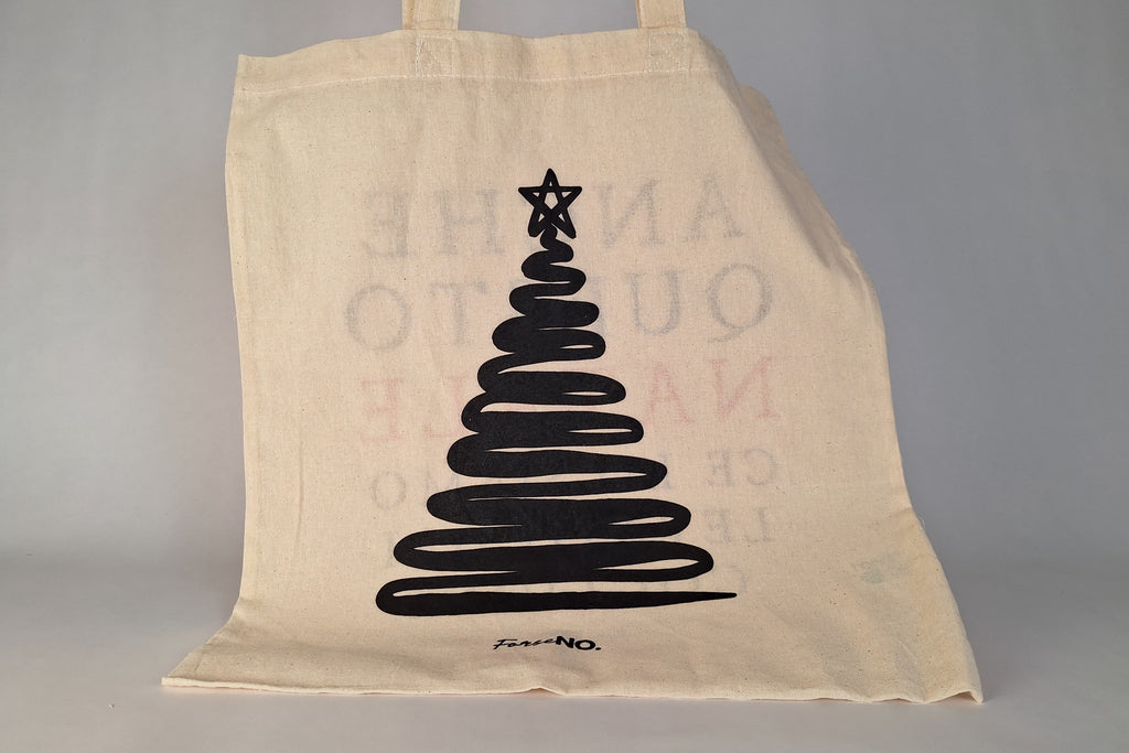 dettaglio dello shoppe  in cotone con alberello natalizio